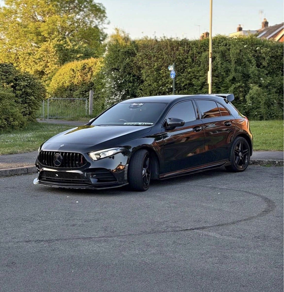 Car on the street before background removal