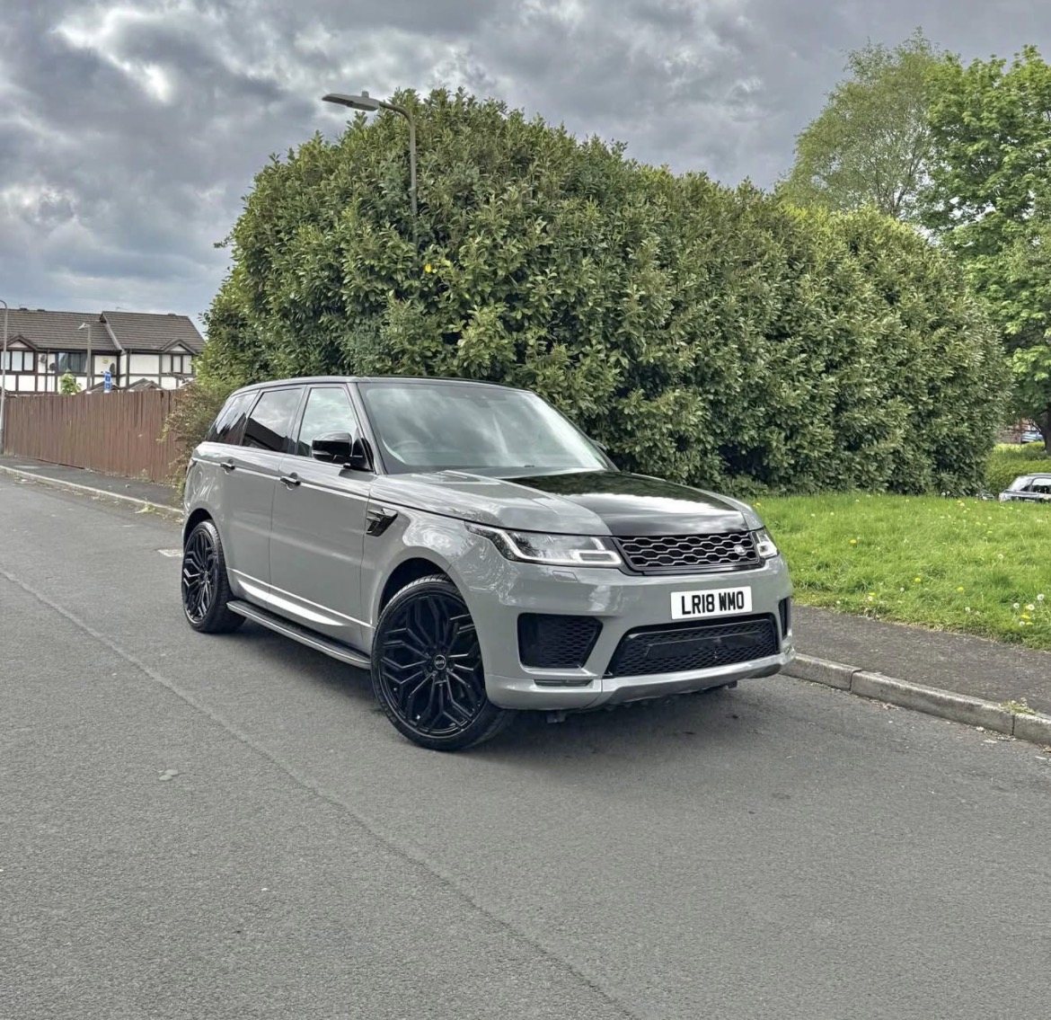 Used car photographed on a messy forecourt before ShowroomShot